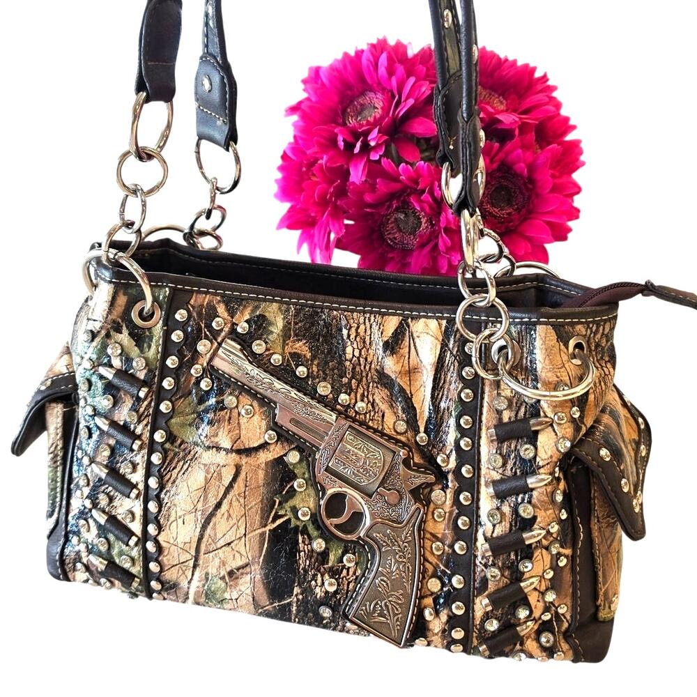 Camouflage Concealed Carry Purse / Bag with pistol and bullet embellishments.
